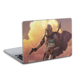 Les nuages ​​du coucher du soleil Mandalorien et Grogu