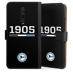 Sideflip mit langer Lasche schwarz